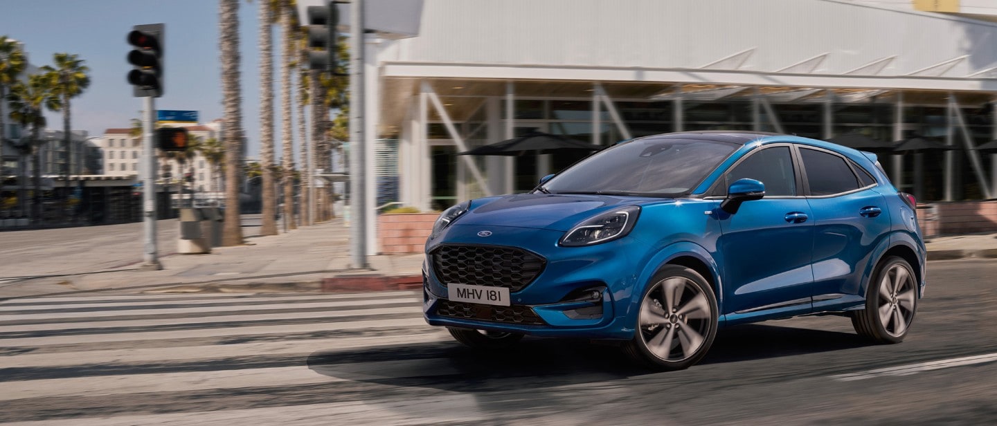 Blue Ford Puma driving