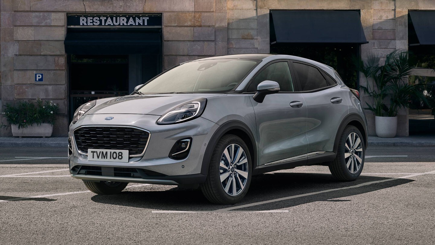 Grey Ford Puma driving in the city