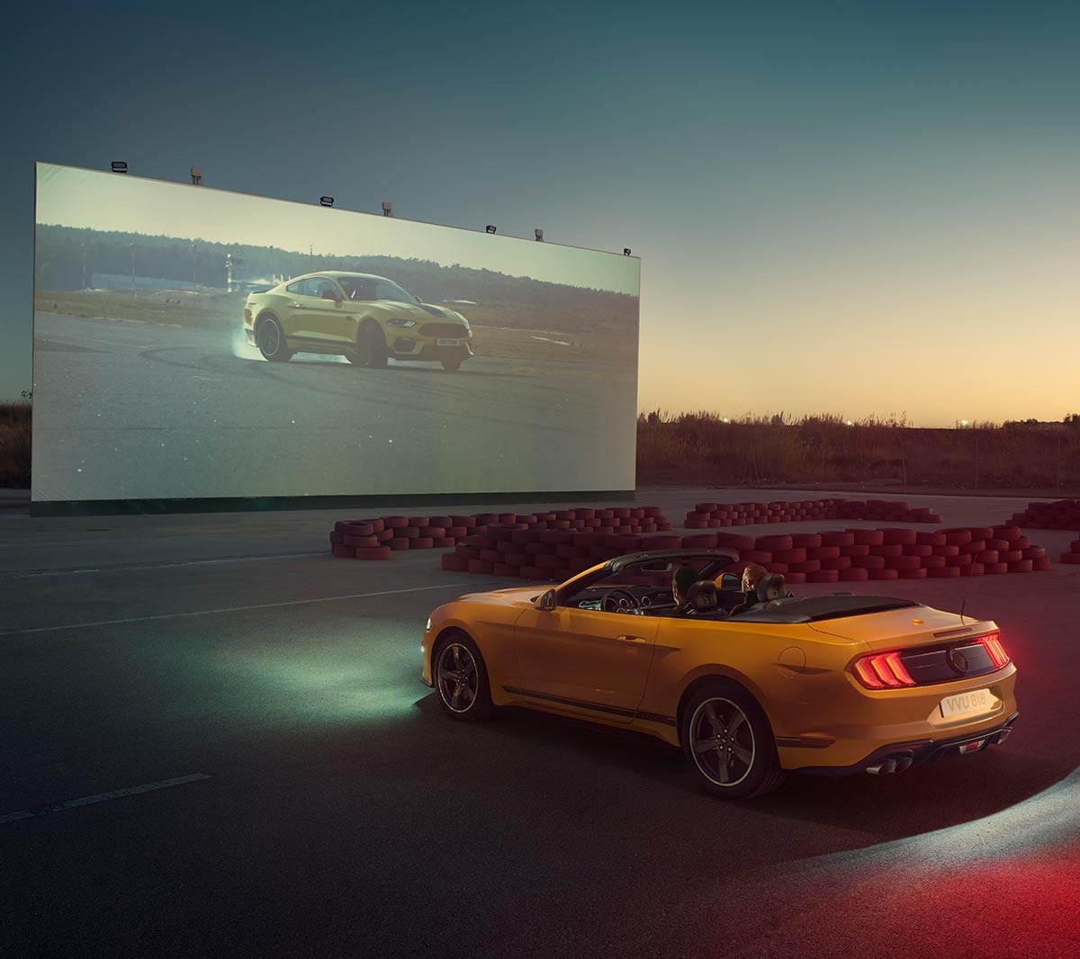 Ford Mustang California Edition parked at a drive-in cinema.