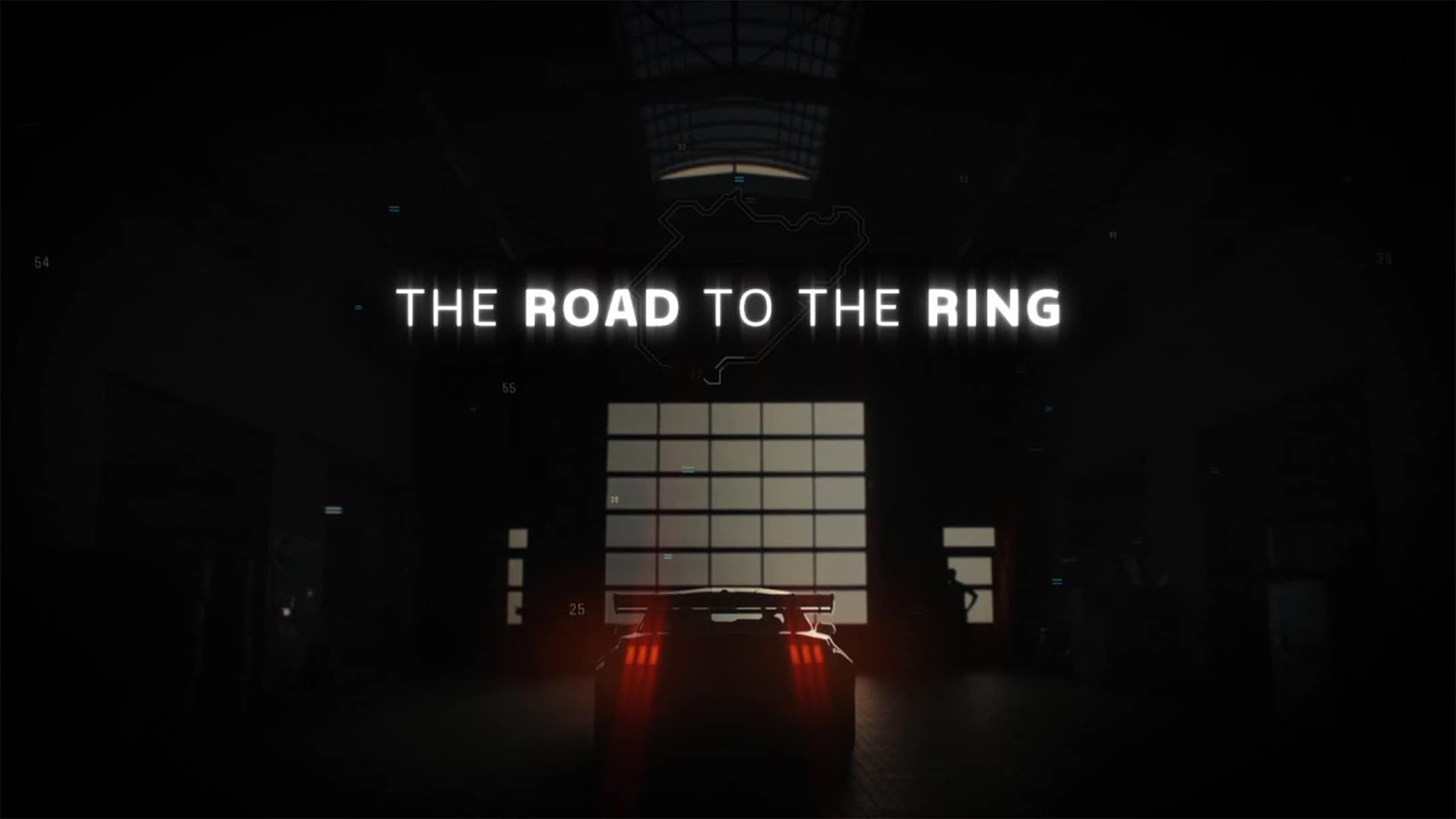 Une Ford Mustang GTD dans un garage de course avec « THE ROAD TO THE RING »