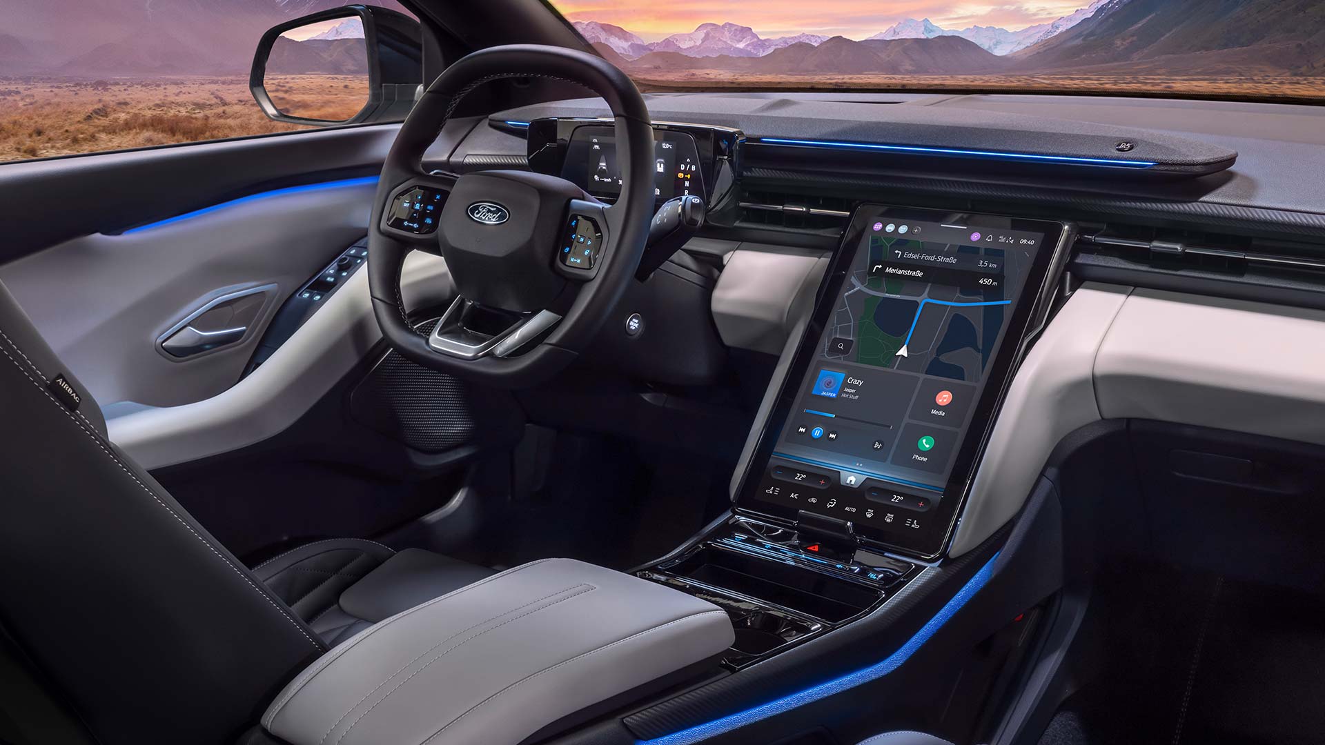 L'habitacle du nouveau Ford Explorer® 100 % électrique avec éclairage ambiant bleu.