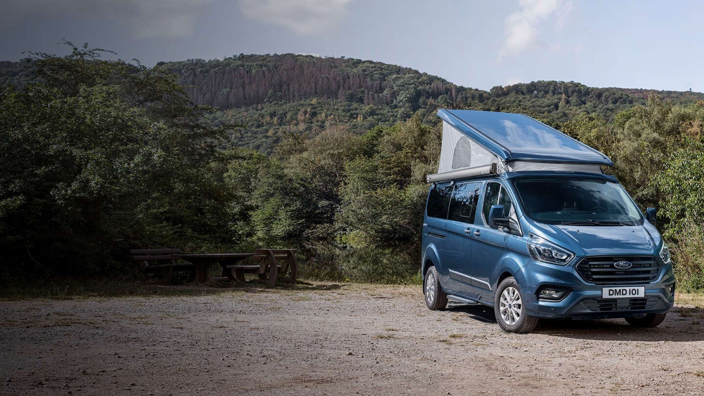 Ford Transit Custom driving on rural road