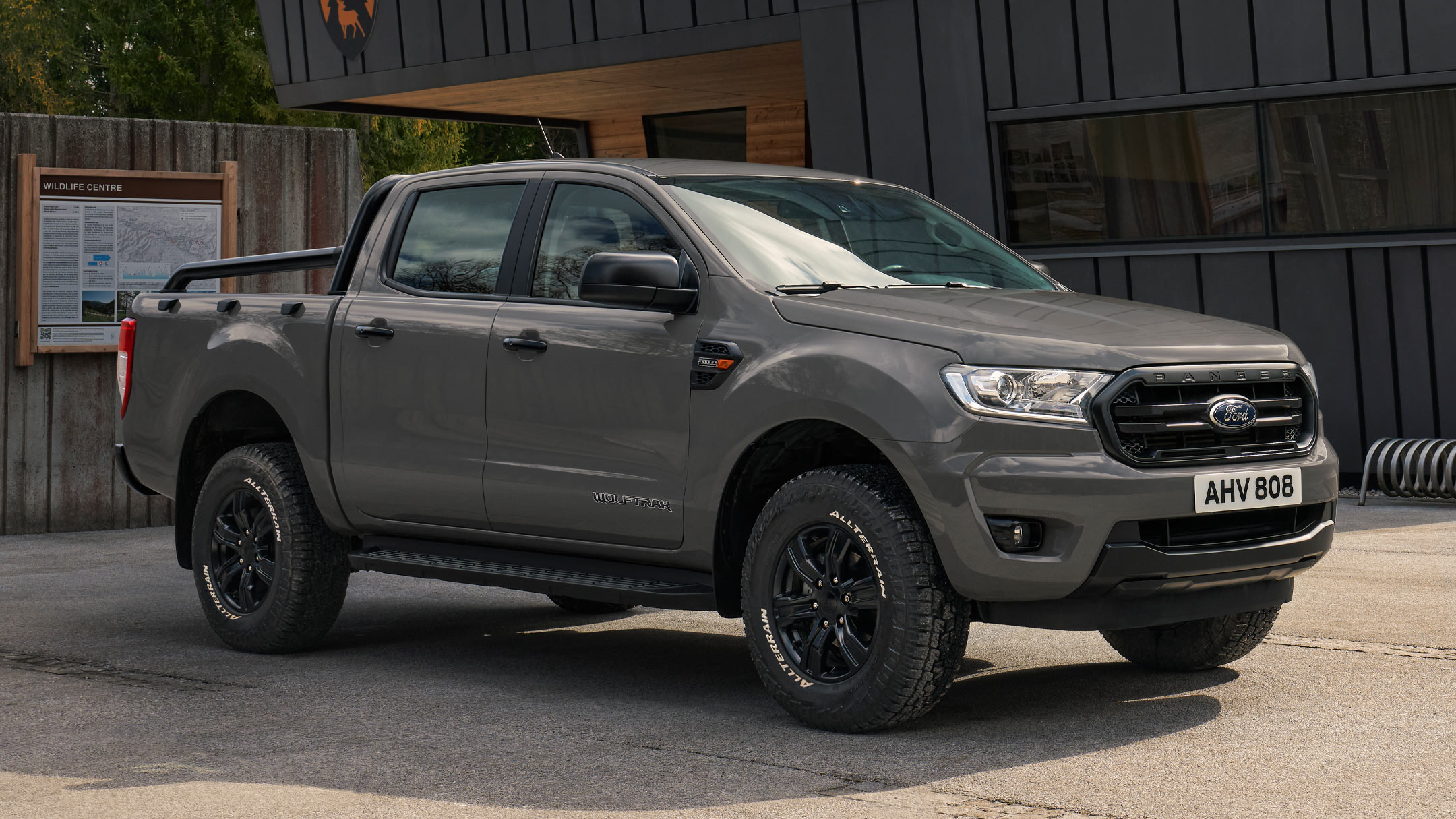 Ford Ranger Wolftrak Double Cab parked in front of a cabin